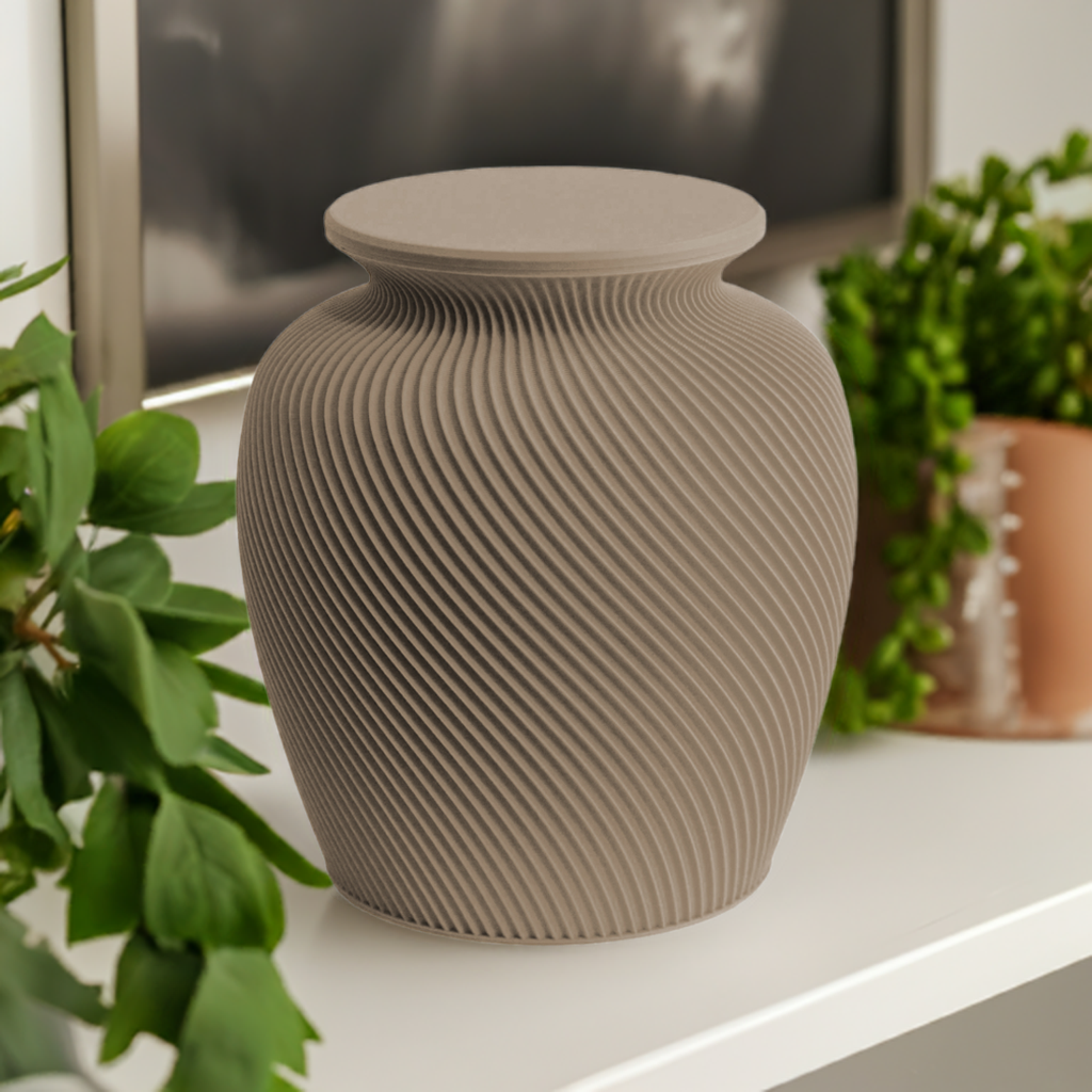 A matte Mocha urn with a spiral texture, displayed on a shelf alongside other decorative items.